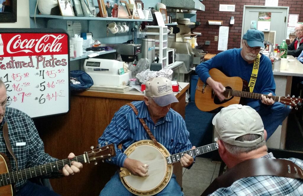 Men with banjos in store