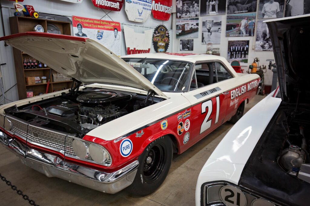 Red racecar with hood up