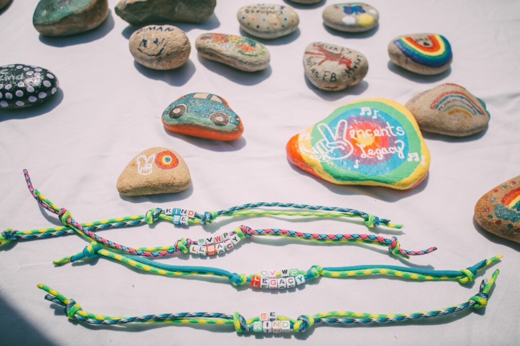 colorful bracelets and painted rocks