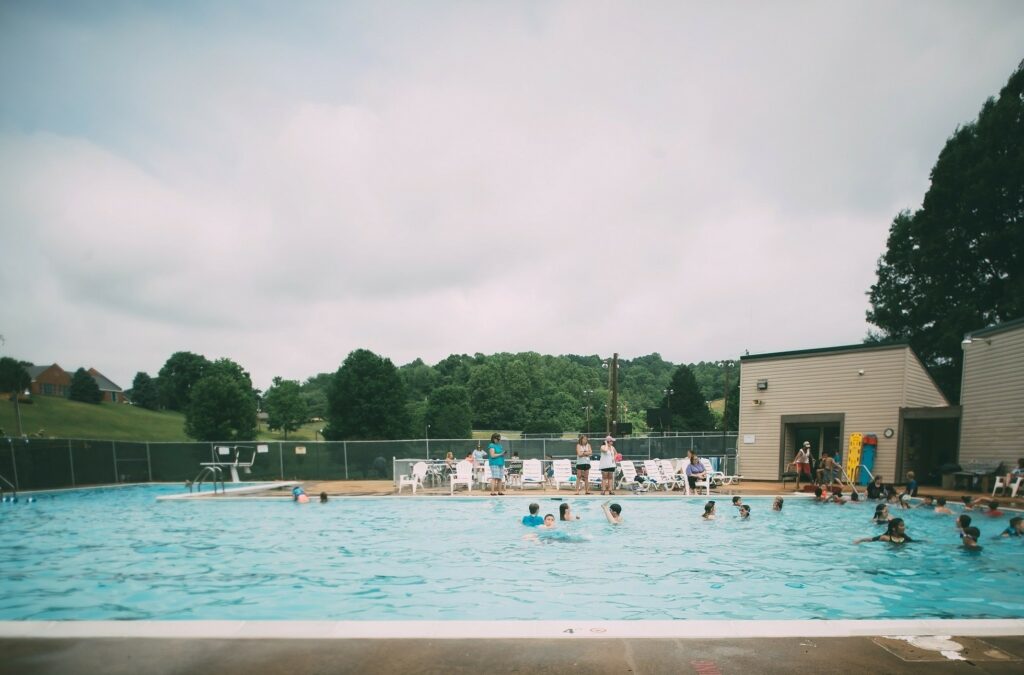 Swimming pool with children and adults