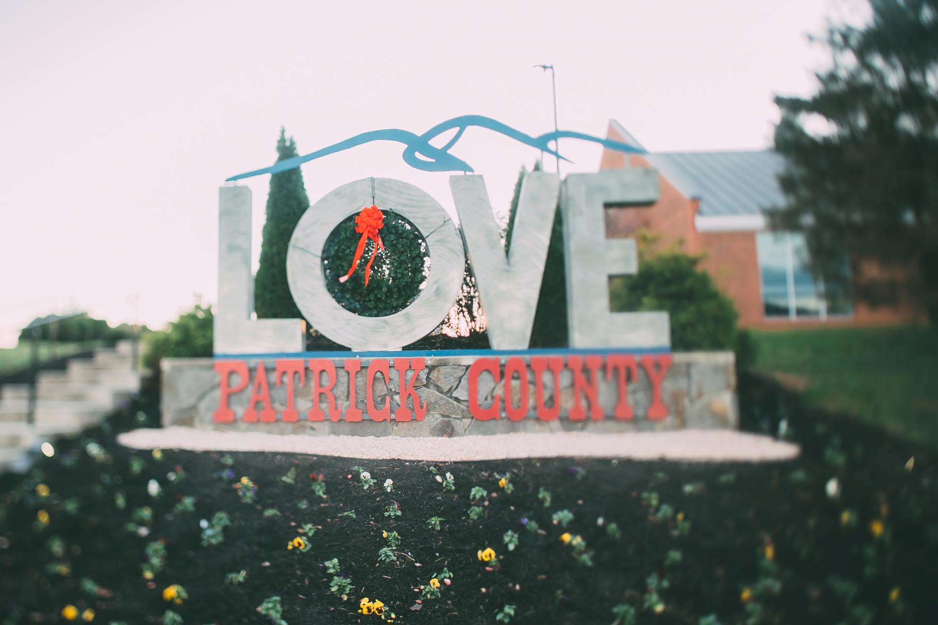 Patrick County LOVE sign with Christmas wreath